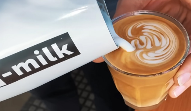 milk adding in coffee