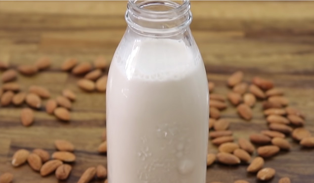 almonds and almond milk bottle