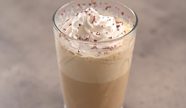 a glass of frappuccino coffee
